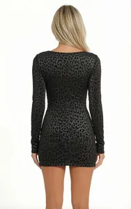 Back view showing the fit of a long-sleeved black leopard print bodycon mini dress