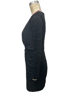 Detailed side view of long sleeve leopard print bodycon dress with elegant ruched waist