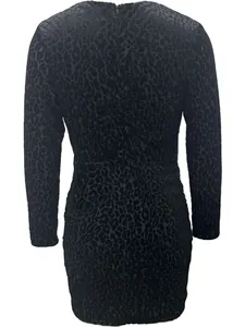 Back view of a black leopard print bodycon dress with a visible back zipper closure.
