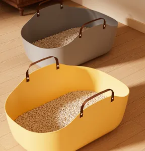Detailed view of yellow and grey portable cat litter boxes with stylish leather handles
