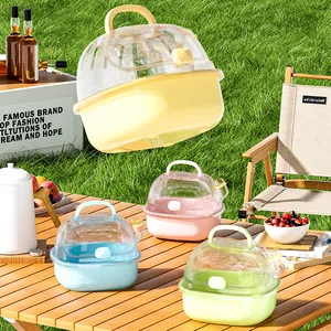 Portable hamster carrier cages in four pastel colors for outdoor travel and camping use