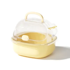 Portable yellow hamster carrier cage with transparent dome top and side water bottle