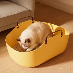 Large yellow portable cat litter box with high sides and brown handles for travel
