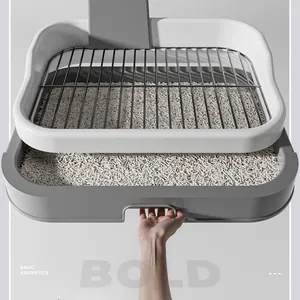 Close-up of easy-to-clean large dog toilet with pull-out drawer design