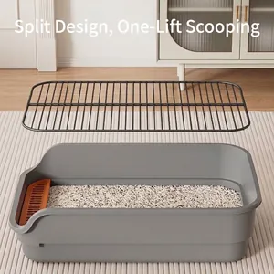 Large grey pet toilet featuring a removable black metal grid and high splash guard walls