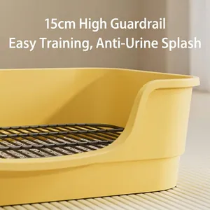 Gelbe Haustier-Hundetoilette mit 15 cm erhöhtem Zaun und schwarzem Metallgitter