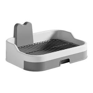 Extra large indoor dog toilet with high splash guard walls and sturdy metal grate