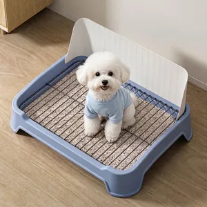 Indoor blue puppy potty training tray with splash guard and iron grid for small dogs
