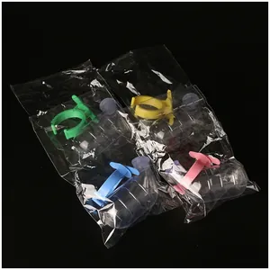 Four 60ml hamster vacuum water bottles in green yellow blue and pink individually packed