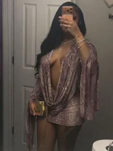 Sexy snake print bodycon dress with deep V-neck and long sleeves for a stylish party look