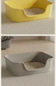 Modern open-top bathtub style cat litter boxes shown in yellow and grey finishes
