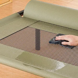 Close-up detail showing the easy-to-clean waterproof leather surface of a pet elevated bed