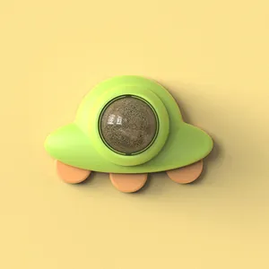 Jouet adorable en forme d'OVNI avec boule d'herbe à chat, design vert et orange vif