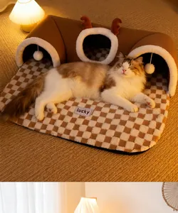 Cozy cat tunnel bed with festive reindeer antlers and a soft checkered mat for pets
