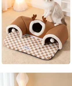Detail view of a cozy brown cat tunnel bed with antler accents and a plush checkered mat