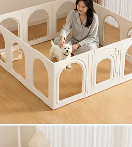 White modular pet playpen for small dogs in a cozy indoor living room setting