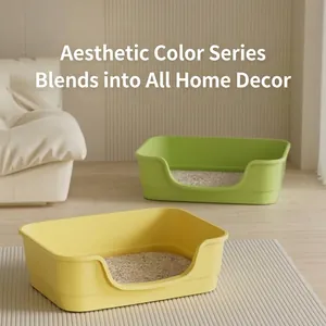 Modern bathtub-style open cat litter boxes in aesthetic yellow and green colors