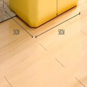 Vista detallada de un arenero grande amarillo para gatos con medidas 35cm por 50cm