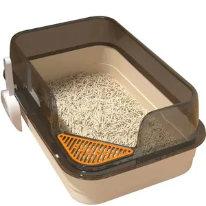 Close-up detail of a semi-enclosed cat litter box with a high fence and litter inside