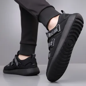 Detailed macro shot of black platform chunky sneakers featuring decorative sport straps