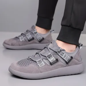 Macro detail of grey platform retro dad sneakers featuring unique FAST decorative straps.