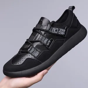 Detailed view of women's black mesh daddy shoes with FAST strap design and thick sole