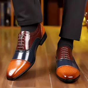 Close-up detail of tricolor Brogue leather shoes with classic decorative perforations