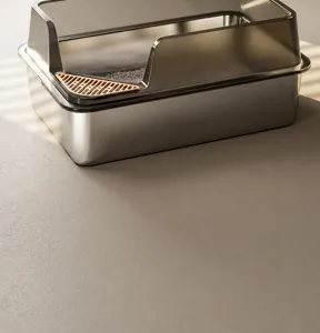 Detailed view of large stainless steel cat litter box with high splash guard