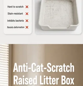 Detailed view of the heightened stainless steel cat litter box wall designed to prevent splashing