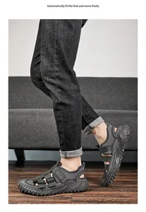 Side view of dark grey breathable men's outdoor beach sandals on model feet