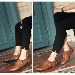 Detail view of brown men's octopus driving loafers with slip-on design and rubber pods