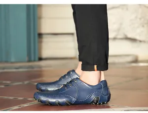 Close-up of blue leather driving shoes for men featuring a unique octopus nub sole