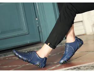 Close-up side view of men's navy blue octopus-sole loafers for outdoor casual wear