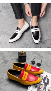 Macro view of stylish men's color-block loafers in black-white and red-yellow variants