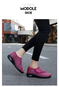 Macro view of purple breathable walking shoes with velcro strap for senior women
