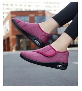 Detailed side view of breathable purple Velcro walking shoes with air cushion soles