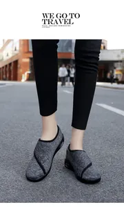 Casual grey marl walking shoes for women featuring breathable mesh and stylish black trim