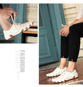 Detail view of men's white leather casual loafers with unique octopus sole
