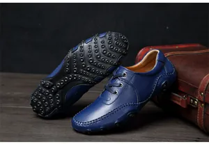 Detail of blue leather driving loafers with unique octopus-inspired rubber soles.
