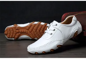 Detail of white men's driving loafers showing the unique octopus studded sole.