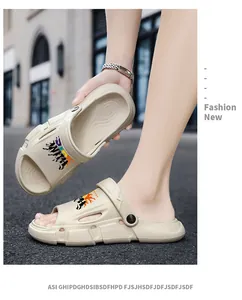 Detailed view of beige couple sports sandals with anti-slip soles for beach use