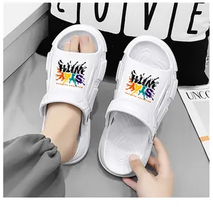 Close-up of white summer outdoor sandals with a vibrant colorful splash print design