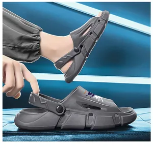 Detailed side view of grey non-slip outdoor sports sandals with adjustable heel strap design