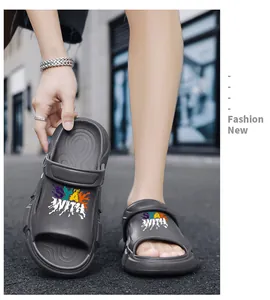 Close-up of stylish grey outdoor sports sandals with colorful 'STAY WITH' graphic print.