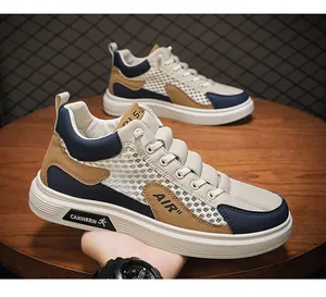Dettaglio ravvicinato della rete traspirante e della pelle sulle sneakers alte da uomo