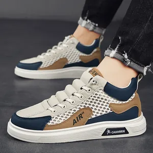 Sneakers alte da uomo in mesh traspirante con un elegante design color block moderno