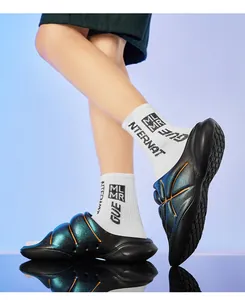 Macro view of iridescent sports slippers with thick soles and reflective finish