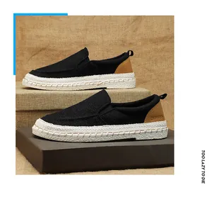 Men's breathable black linen slip-on loafers with woven sole and leather heel details