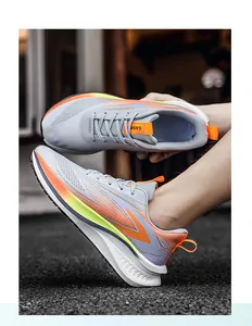 Breathable grey mesh running shoes with vibrant orange gradient accents and cushioned sole