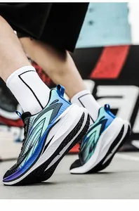 Dynamic detail shot of blue breathable mesh running shoes with shock-absorbing thick soles